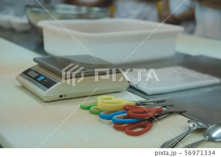 digital scale scissors in food production factory industry 56971334