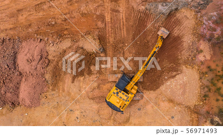Aerial view excavator working on a construction 56971493