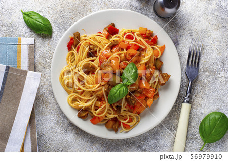 Pasta with eggplant, pepper and tomatoes 56979910