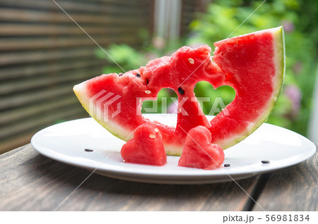 Watermelon hearts nature green leaves background 56981834