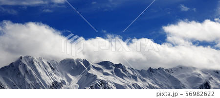 Winter snow mountains at nice sunny day Winter snow mountains at nice sunny day 56982622