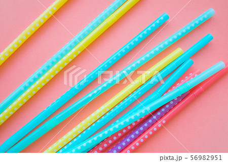 Multi-colored straws for drinking cocktail . 56982951