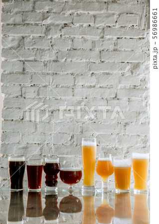 Glasses of different kinds of beer, time for oktoberfest Glasses of different kinds of beer, time for oktoberfest 56986661