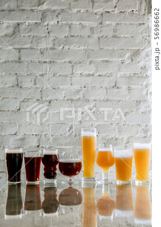 Glasses of different kinds of beer, time for oktoberfest Glasses of different kinds of beer, time for oktoberfest 56986662