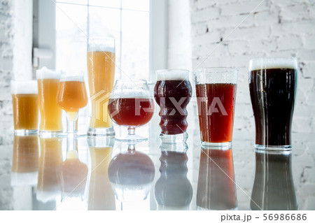 Glasses of different kinds of beer, time for oktoberfest Glasses of different kinds of beer, time for oktoberfest 56986686