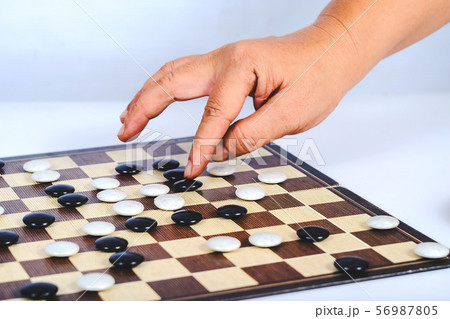 Board game Go and black and white bones. Go or Board game Go and black and white bones. Go or 56987805