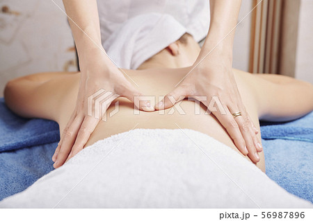 Professional back massage 56987896