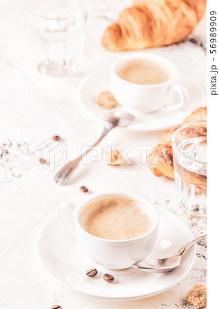Traditional breakfast with fresh croissants on Traditional breakfast with fresh croissants on 56989909
