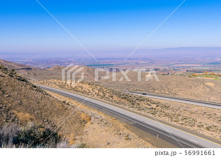 Highway and plains seen from the Manastash Vista Point viewpoint near Yakima, 56991661