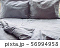 Messy grey hotel bed, honeymoon, background 56994958