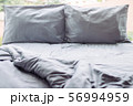 Messy grey hotel bed, honeymoon, background 56994959