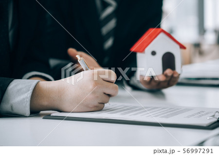 Real estate agents submit documents for customers 56997291