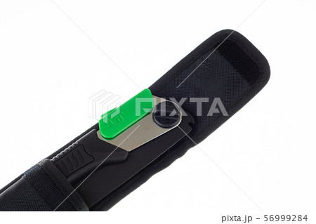 Closeup of a folding handsaw in pouch Closeup of a folding handsaw in pouch 56999284