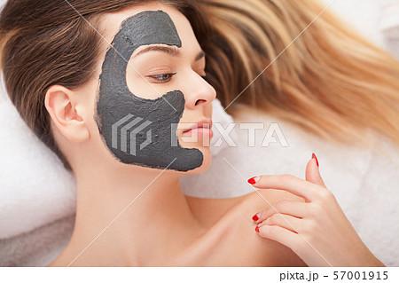 Facial Skin Care. Beautiful Woman Getting Cosmetic Mask In Salon 57001915