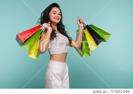 Black Friday Concept. Happy girl holds shopping 57002306