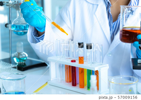 Scientists researching in laboratory. Professional Scientists researching in laboratory. Professional 57009156