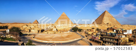 Giza Pyramids and living buildings in front of Giza Pyramids and living buildings in front of 57012583