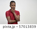 Thoughtful man holding his chin and thinking 57013839