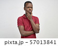 man looks down, tries to remember something 57013841
