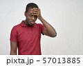 man in the Studio holding his hand over his head 57013885