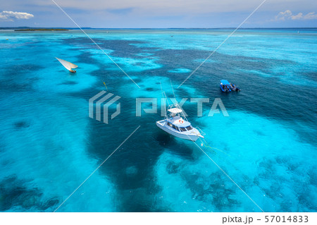 Aerial view of the yachts, fishing boats in the sea Aerial view of the yachts, fishing boats in the sea 57014833