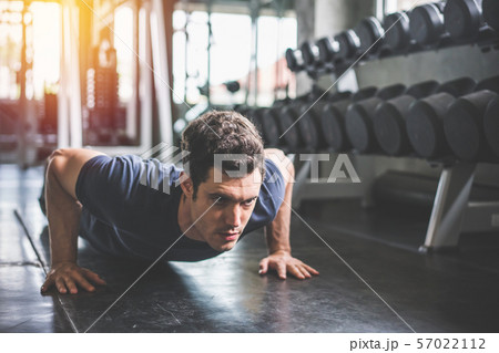 Handsome man and strong guy doing push up Handsome man and strong guy doing push up 57022112