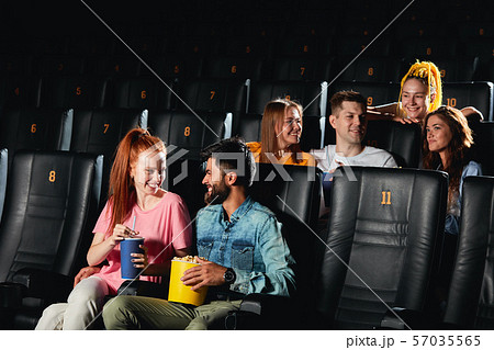 romantic loving couple having fun at the cinema 57035565
