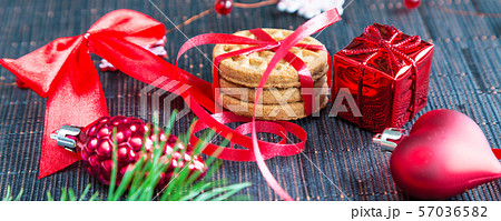 Christmas background with cookies and decorations Christmas background with cookies and decorations 57036582