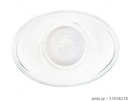 top view of cracked boiled egg in glass egg cup 57038278