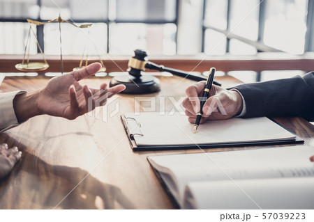 Male lawyer or judge consult having team meeting Male lawyer or judge consult having team meeting 57039223