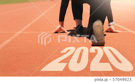 2020 Newyear , Athlete Woman starting on line for 2020 Newyear , Athlete Woman starting on line for 57049023