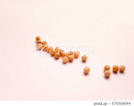 Light orange color sunstone isolated on white background. Light orange color sunstone isolated on white background. 57050644