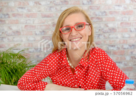 beautiful blonde business woman working at office beautiful blonde business woman working at office 57056962