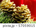 golden pine cone on a christmas decoration with 57059015