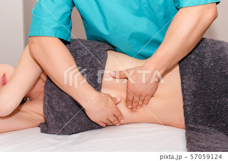 Woman having chiropractic adjustment. Osteopathy, Woman having chiropractic adjustment. Osteopathy, 57059124