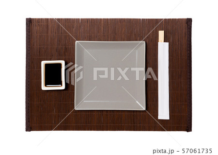 Empty gray square plate with chopsticks for sushi Empty gray square plate with chopsticks for sushi 57061735