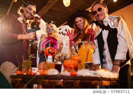 Young People Having Fun at Halloween Party 57063711