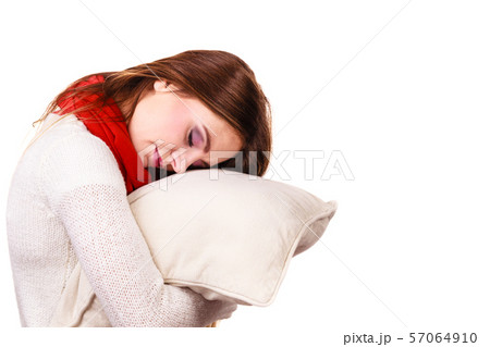 Woman sleepy tired with pillow almost falling Woman sleepy tired with pillow almost falling 57064910