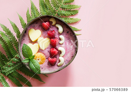 Healthy breakfast banana and blueberry smoothie 57066389