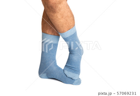 socks on the legs of a man isolated 57069231
