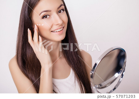 Beautiful woman face close up studio on pink. Picture of beautiful woman beautiful woman in spa 57071203