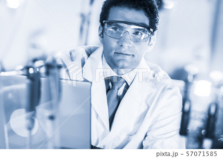 Portrait of an engineer in his working environment. Portrait of an engineer in his working environment. 57071585