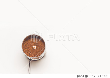 Close up coffee beans in coffee grinder. Espresso 57071838