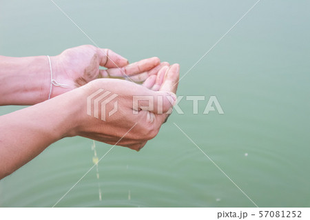 water hands with drought water hands with drought 57081252