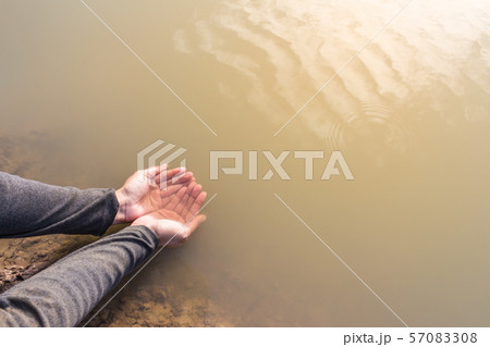 water hands with drought 57083308