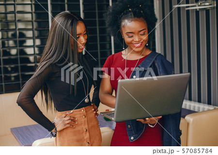 two business woman in a cafe two business woman in a cafe 57085784