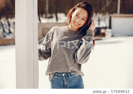 Happy girl in a winter city 57089632