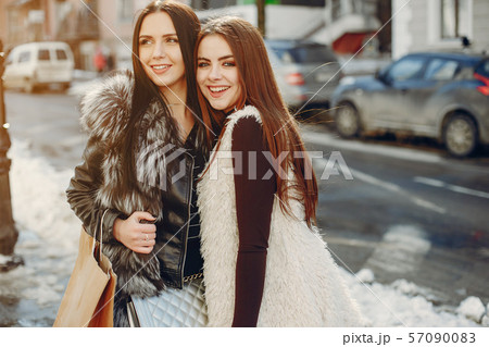 Two girls in a city Two girls in a city 57090083