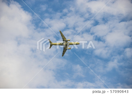 Big passenger plane flying in the cloudy sky Big passenger plane flying in the cloudy sky 57090643