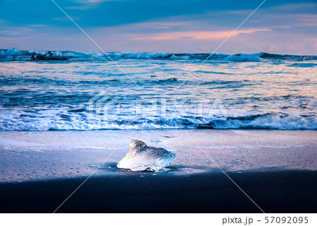 Iceberg pieces on Diamond beach in Iceland during Iceberg pieces on Diamond beach in Iceland during 57092095